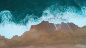 waves crashing on beach